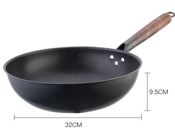 Le Kosanji Wok für Elektroherd direkt auf dem Elektroherd im Einsatz