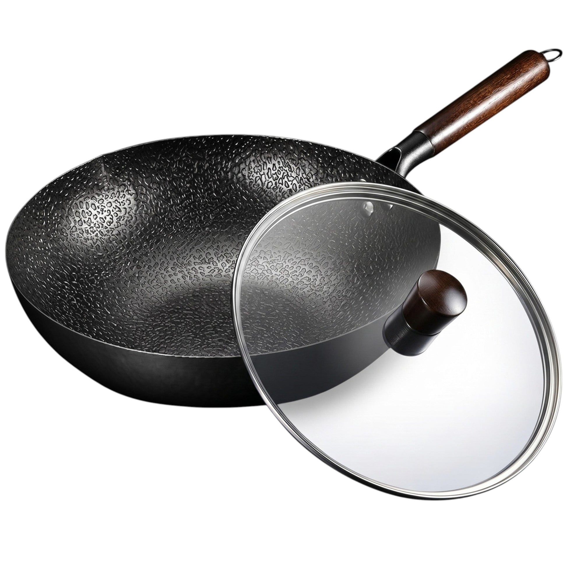 Le Haku Wok Carbonstahl Ceranfeld beim Schwenken auf glattem Ceranfeld