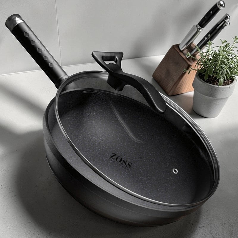 Le Takino Edelstahl Wok von oben mit spiegelnder Oberfläche