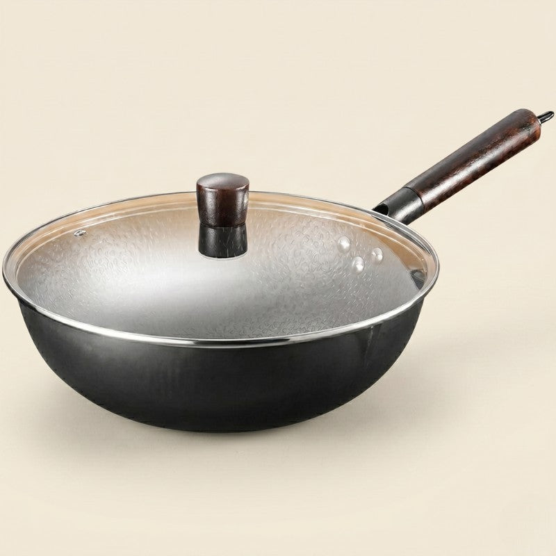 Le Haku Wok aus Carbonstahl ceranfeldgeeignet in produktneutraler Frontansicht