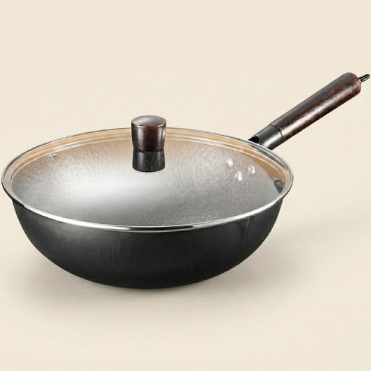 Le Haku Wok aus Carbonstahl ceranfeldgeeignet in produktneutraler Frontansicht