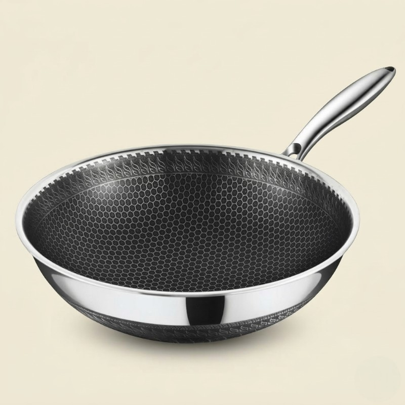 Le Yamuna Edelstahl-Wok mit Glasdeckel im Detail des polierten Randes