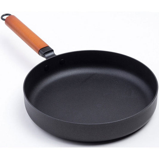 Le Pokaj Karbonstahl-Wok ohne Beschichtung in puristischer Vorderansicht