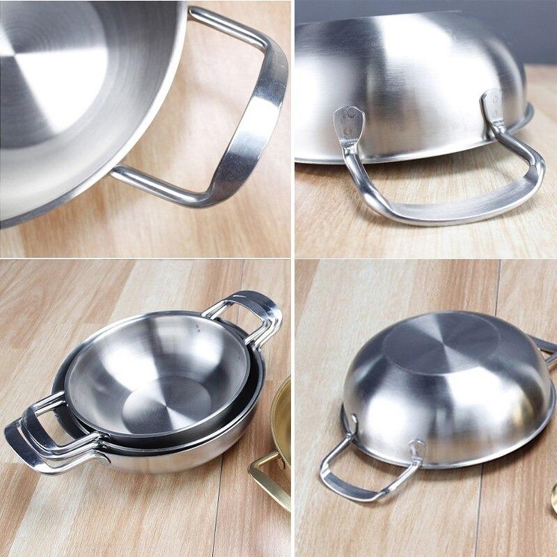 Le Daisen Wok Pfanne Edelstahl 20 cm beim Kochen auf dem Herd