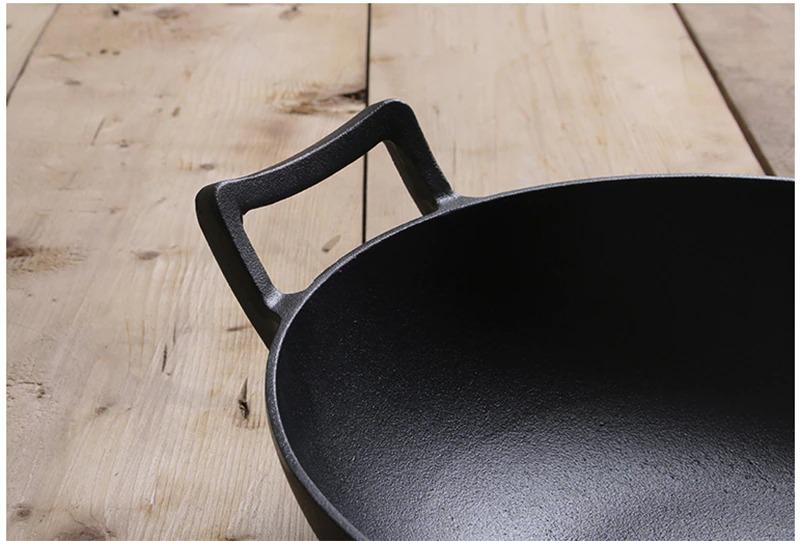 Le Fulan Wok Gusseisen Ceranfeld seitliche Ansicht mit massiven Griffen