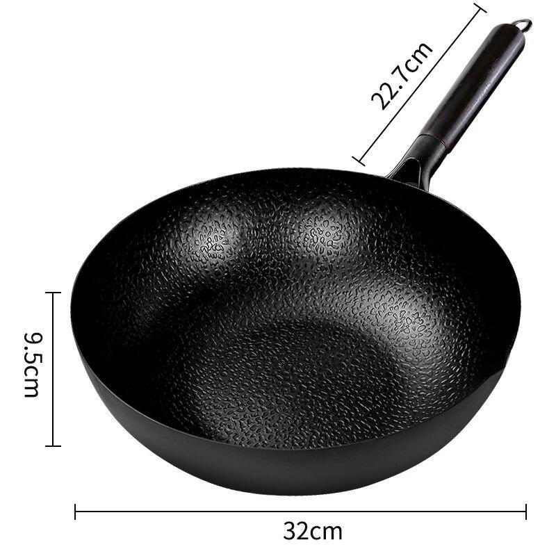 Le Haku Wok Carbonstahl Ceranfeld Detail der gehämmerten Innenoberfläche