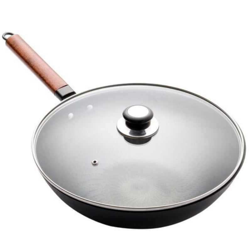 Le Tokaji antihaftbeschichteter Karbonstahl-Wok mit goldbraunem Hühnchen