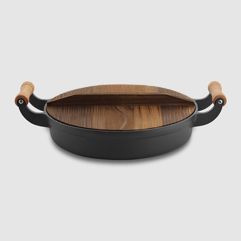 Le Gamaksan BBQ Wok im Einsatz auf dem Grill mit aromatischen Zutaten