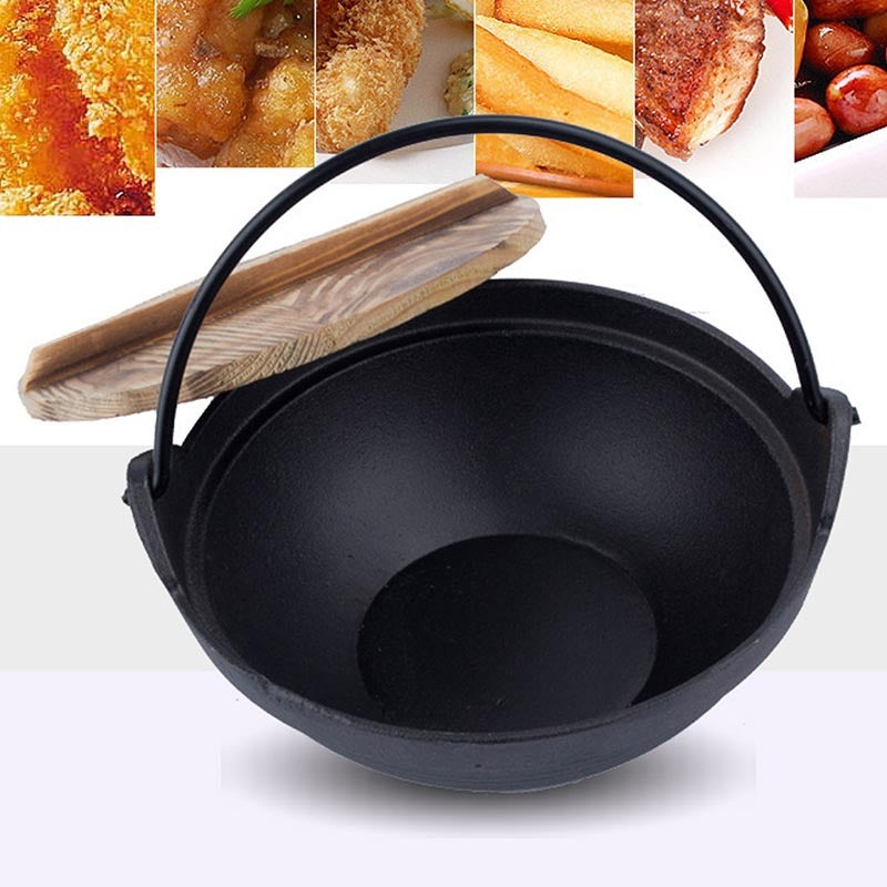 Le Kang Wok Schale Gusseisen Detailaufnahme der robusten Oberfläche und Materialstruktur