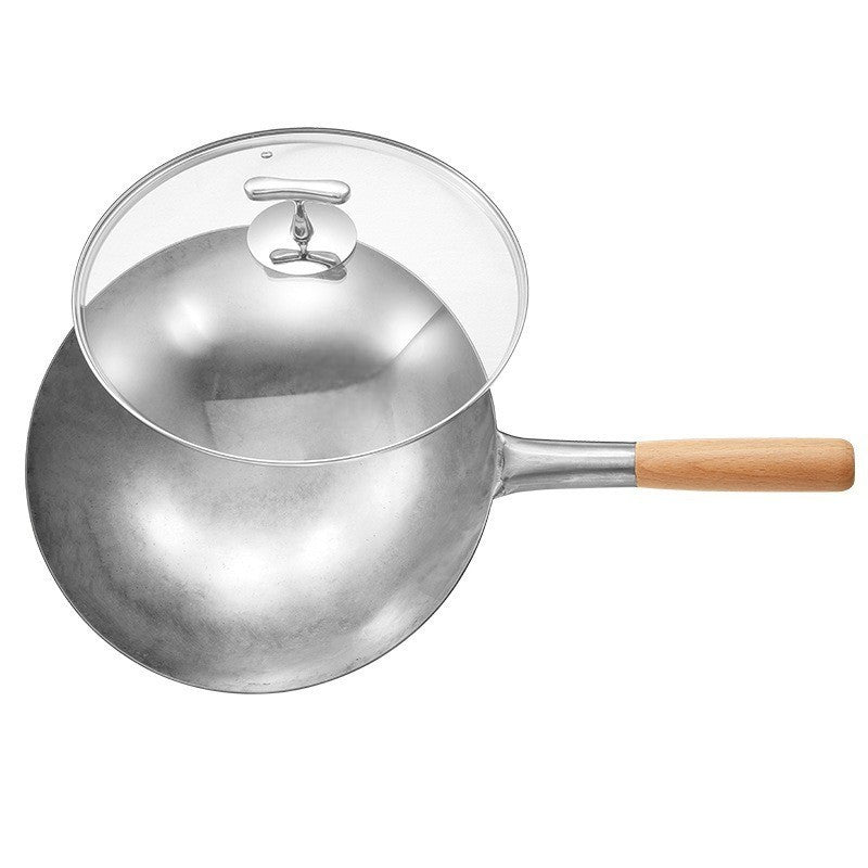 Le Kirishima Original Chinesischer Wok beim Kochen auf dem Induktionsfeld