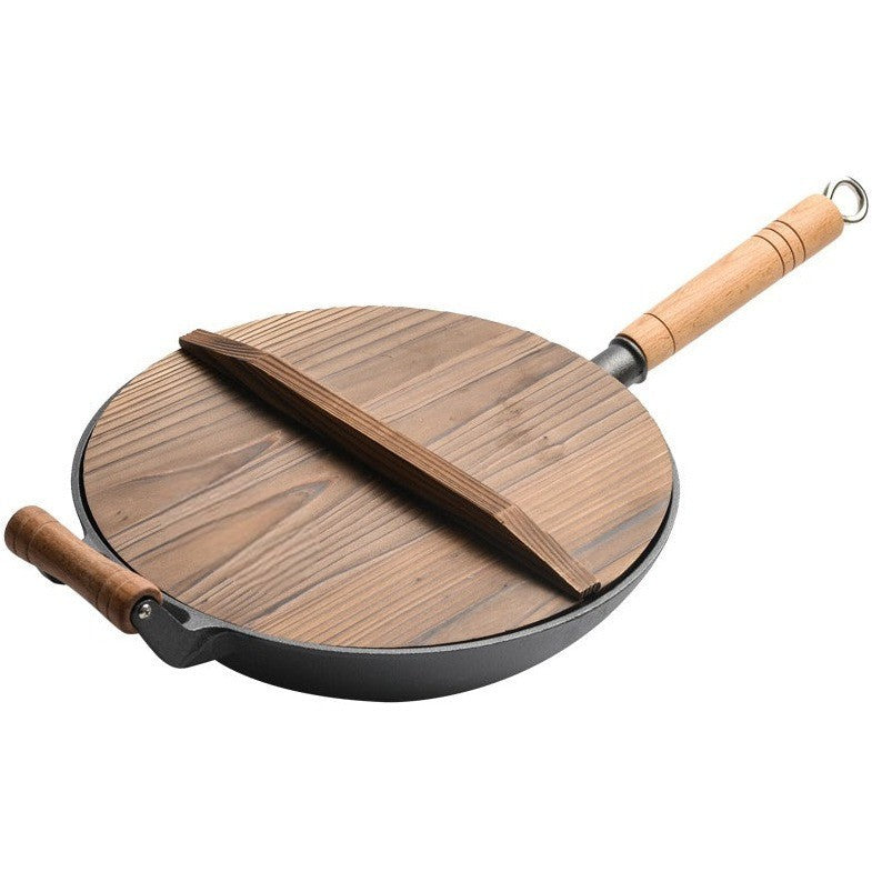 Le Hokan japanischer Gusseisen-Wok mit Holzdeckel in Vorderansicht